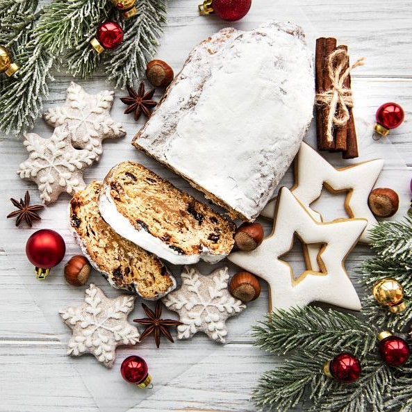 Christmas stollen on wooden background